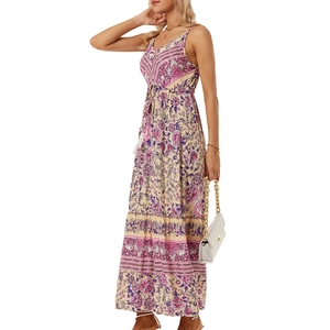 Detail of bohemian floral print on a light summer maxi dress with high waist design