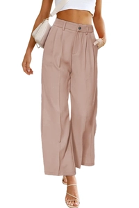 Detail of high waisted wide leg trousers with button closure and elegant pleated front