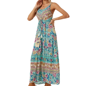 Close-up of bohemian floral print long dress featuring adjustable tassel drawstring waist