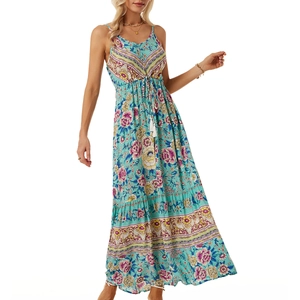 Bohemian floral maxi dress with blue print, V-neck straps, and tassel drawstring waist