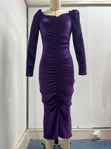 Detail of dark purple velvet maxi dress featuring ruching and elegant square neckline