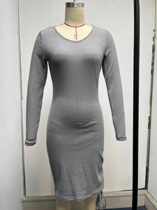 Detailed view of grey knitted rib texture on the long sleeve slim fit sweater dress
