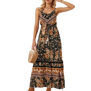 Bohemian floral maxi dress with V-neck, spaghetti straps and decorative white tassels