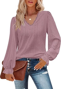 Detail of V-neck lace trim and pleated sleeves on women's pink long sleeve tunic top