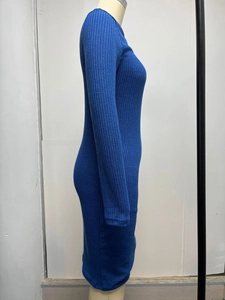 Detailed side view showing blue ribbed knit texture and slim fit of the long sleeve dress
