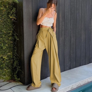 Women high waisted wide leg trousers in mustard yellow with tie waist and loose fit