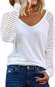 Close-up of white long sleeve top featuring striped sheer mesh patchwork on the sleeves