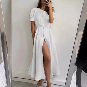 Elegant white button-down midi dress with puff sleeves and cinched waist for summer wear