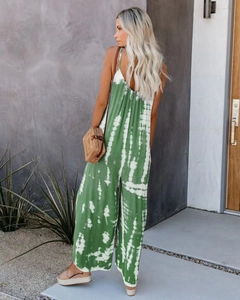 Detail of green and white tie-dye wide-leg jumpsuit with an elegant open-back design