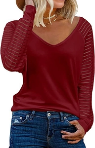 Detail of burgundy V-neck top with semi-transparent striped mesh patchwork sleeves