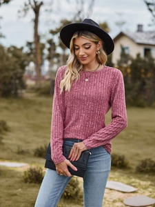 Detail of mauve long sleeve ribbed knit top with a classic round neck and slim fit