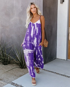 Detail of purple tie-dye jumpsuit with thin straps and loose fit for summer