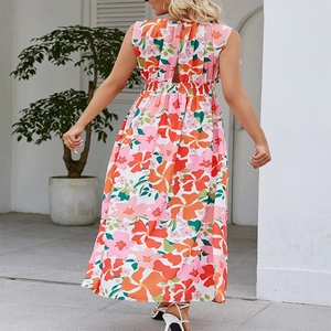 Women's summer backless halter maxi dress with vibrant tropical floral print and elastic waist