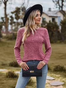 Detailed close-up of ribbed knit texture on a long sleeve plum crewneck top