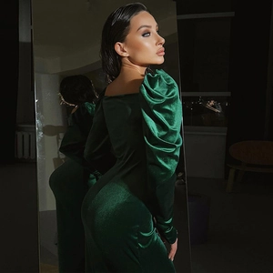 Elegant dark green velvet long sleeve maxi dress with pleated details and slim fit style