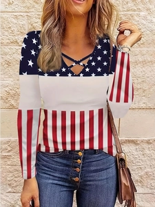 Women's V-neck top with American flag star and stripe print and crisscross neck detail
