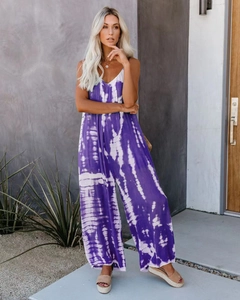 Detail view of purple and white tie-dye sleeveless wide-leg jumpsuit with V-neckline