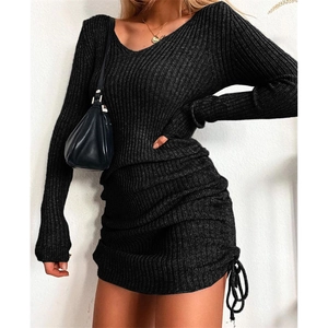 Slim fit black V-neck knitted dress with long sleeves and side drawstring ruching details