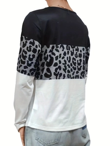 Rear view detail of women's long sleeve T-shirt with leopard patchwork and color block
