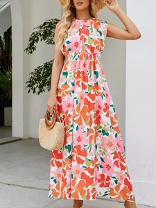 Summer sleeveless floral halter maxi dress in vibrant orange and pink with cutout detail
