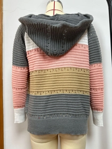 Detail view of the colorful striped knit back with delicate hollow-out crochet texture