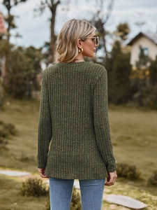 Close-up of olive green ribbed knit texture on long sleeve slim fit crew neck T-shirt