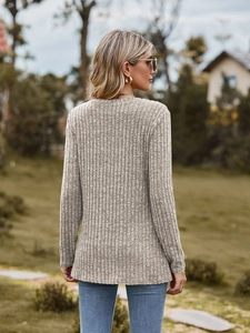 Detail of ribbed knit texture on long sleeve top with outdoor model lifestyle view