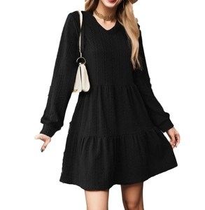 Women's black V-neck long sleeve tiered dress with textured fabric and ruffled hem