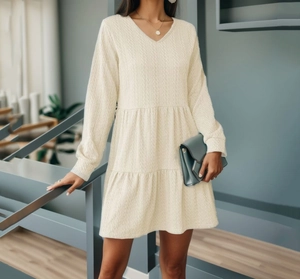 Chic cream white V-neck long sleeve tiered dress in textured knit waffle fabric