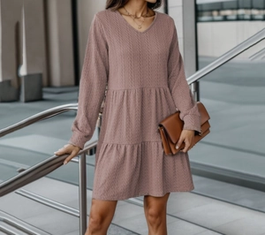Long sleeve V-neck tiered dress in mauve waffle texture with elegant layered skirt