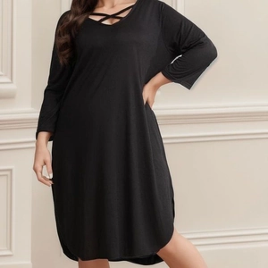 Women's plus size black V-neck maxi dress with criss-cross detail and 3/4 sleeves