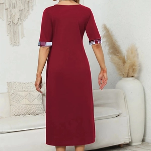 Detail view of burgundy long dress with plaid patchwork cuffs and casual straight cut back