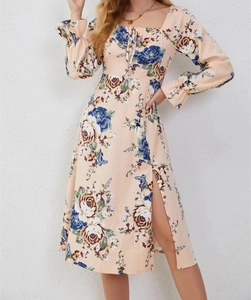 Detail of floral long sleeve dress with square neckline and adjustable drawstring front