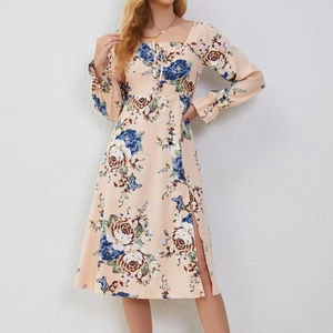 Detail of square neckline with lace-up ties on floral long sleeve midi dress