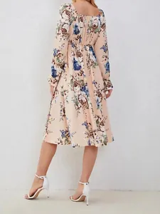 Elegant floral square neck midi dress with long sleeves and smocked waist detail