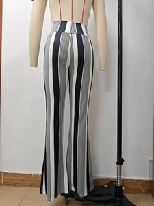 Rear view of black and white vertical striped high waist flare pants for women