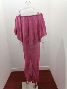 Detail of rose pink sequin off-shoulder dress featuring ruffled back and hem slit design