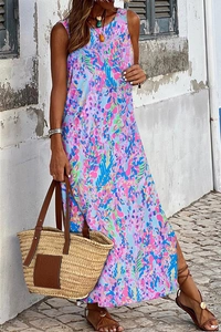 Detail of the colorful floral abstract pattern on a sleeveless round neck maxi dress