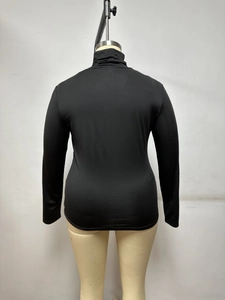 Close-up of black turtleneck long sleeve slim fit knit top back view on mannequin