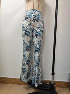 Detail of high waist leopard print flare pants for women in blue and black pattern