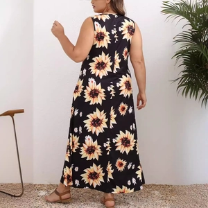 Sleeveless plus size maxi dress featuring vibrant sunflower print on black fabric