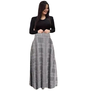 Robe longue patchwork à manches longues avec haut noir à col rond et jupe pied-de-poule chic