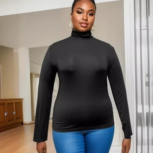 Slim fit black turtleneck long sleeve knit top paired with blue jeans for casual wear