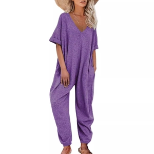Short sleeve purple V-neck jumpsuit for women featuring loose harem style and side pockets