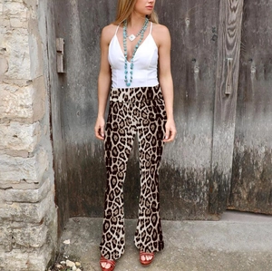 Detail view of high-waisted leopard print flare pants with trendy animal pattern design