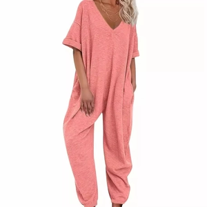 Women's V-neck short sleeve coral pink jumpsuit with loose fit legs and pockets