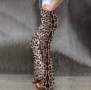 Detail view of high waisted leopard print flare trousers with a retro bohemian style design
