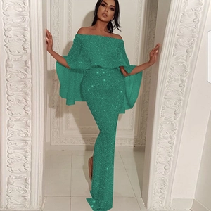 Detail of green sequin off-shoulder evening dress with layered ruffle cape and slim fit
