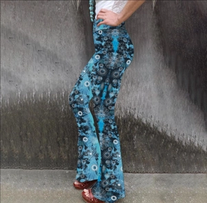 Detail of high waisted flare trousers with blue tie-dye mandala floral print