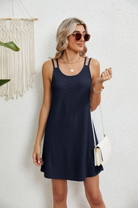 Detailed texture of navy blue sleeveless lace dress with delicate double shoulder straps